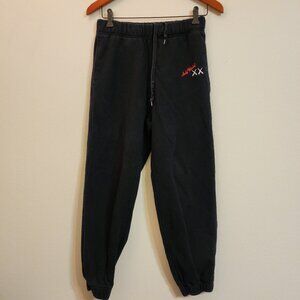 Uniqlo Sweatpants Unisex Small Black KAWS Andy Warhol Collab Graphic Joggers